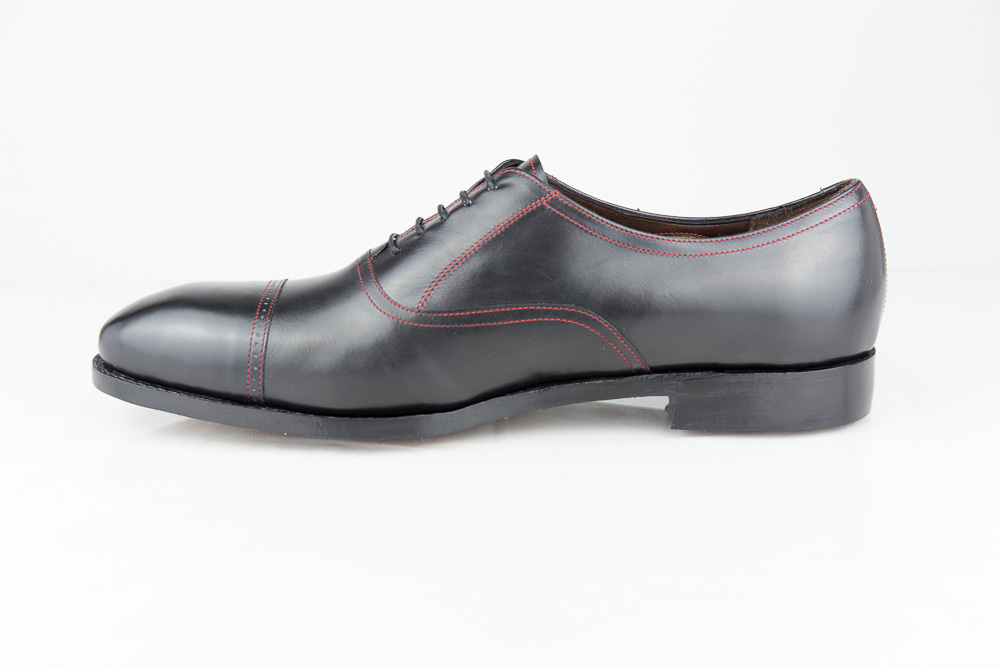 Men bespoke shoe shiny black leather side view